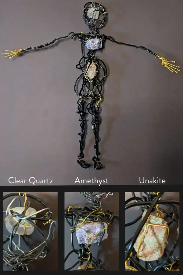 Armature of Ella the forest spirit art doll showing clear quartz, amethyst, and unakite wired into her body frame, symbolizing clarity, intuition, and healing (among other gifts).
