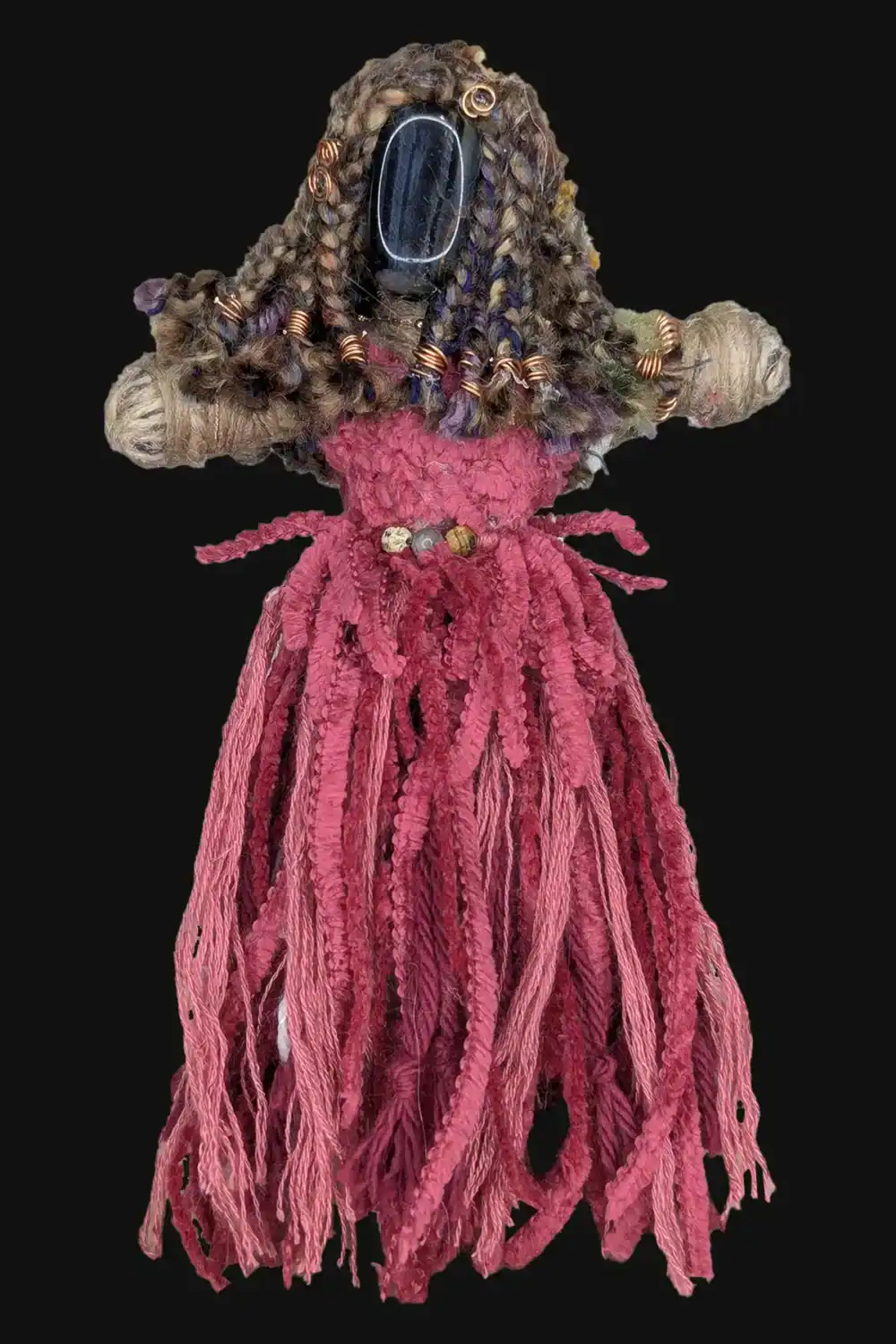 Absynthe Recovery Art Doll featuring a Blue Tiger’s Eye head, Selenite feet, multicolored yarn hair, and a vibrant pink skirt, shown against a black background.