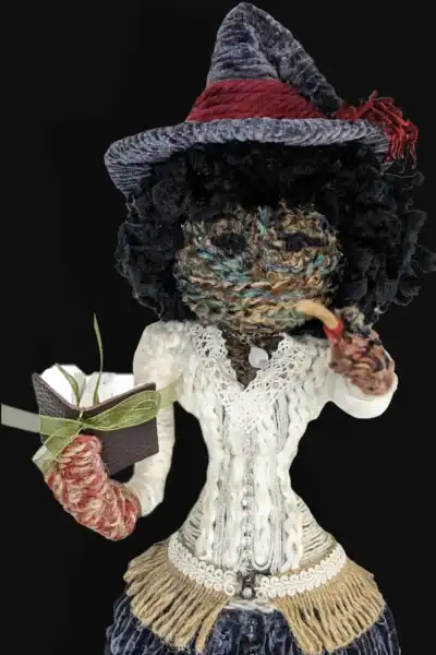 Hannah the Kitchen Witch art doll, front view showcasing intricate details of her hat, lace bodice, and velvety skirt